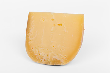 dutch cow's milk cheese called Gouda isolated on white background