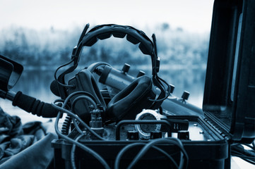 Headphones are on the radio station. The concept of political instability, radio broadcasts,...