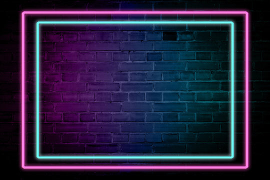 Lighting Effect frame pink and blue neon on brick wall for background party or your text.