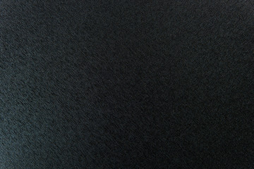 black stone textured background close up