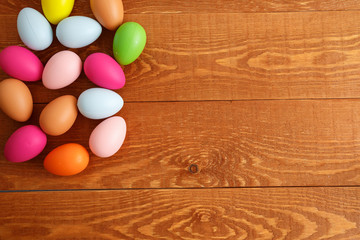 Colorful Easter Eggs On Wooden Table Background