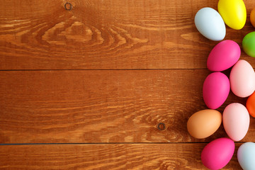 Colorful Easter Eggs On Wooden Table Background