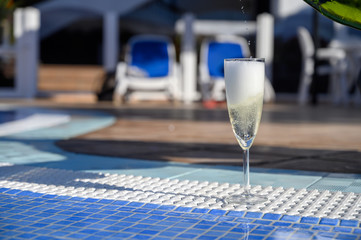 Pool party with one glass of   bubbles white champagne or cava wine, romantic event or all...