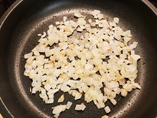 Golden fried onions in a pan