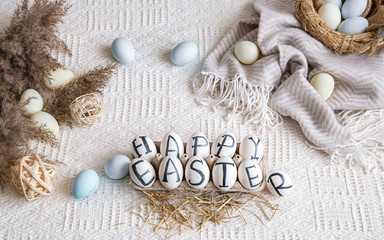 Fototapeta na wymiar Easter eggs with the inscription happy Easter, holiday decor .