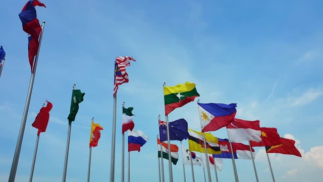 International multi flags pole sway in outdoor wind abstract of world collaboration