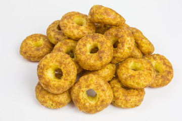 sweet and salty snack - corn puff donuts with peanuts and caramel