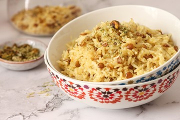 Vegetarian Mujaddara: traditional Arabic dish rice with lentils