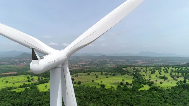 Aerial drone view of wind turbine farm. Green power, environment friendly and renewable energy concept	