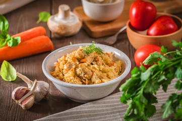 Rice pilaf with chicken meat and vegetables