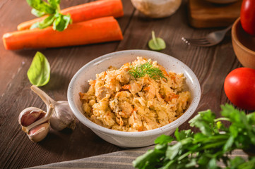 Rice pilaf with chicken meat and vegetables