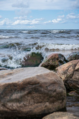 sea waves crushing on mole 