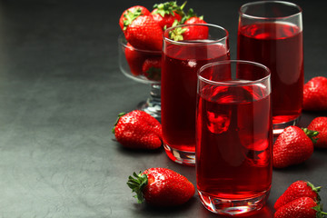 Glasses with strawberry drink with ice	