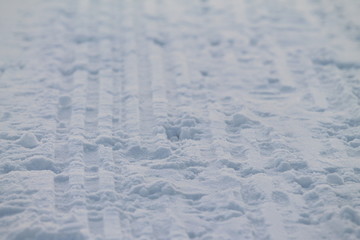 Rribbed footprint in snow left snowcat.