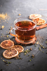 A Cup of freshly brewed black tea on dark background