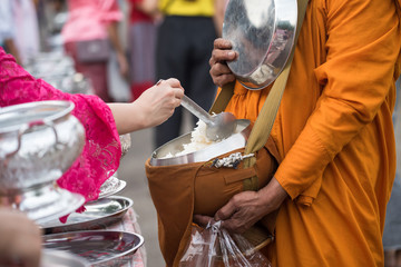 offer food to monk, Sangkhlaburi - Powered by Adobe