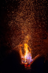 Smithy fire flame tips with sparks closeup