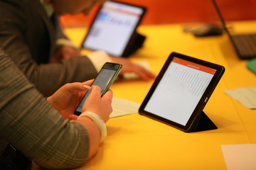 close up a person is looking at his mobil screen