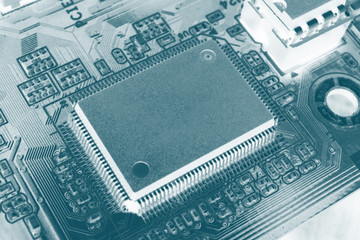 Close up view of central computer processor CPU blank microchip for copy space. Motherboard circuit background