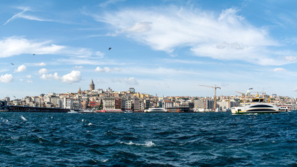 Obraz premium Karakoy/Beyoglu district, Galata Port, Galata Tower and city ​​lines ships, Istanbul, Turkey.