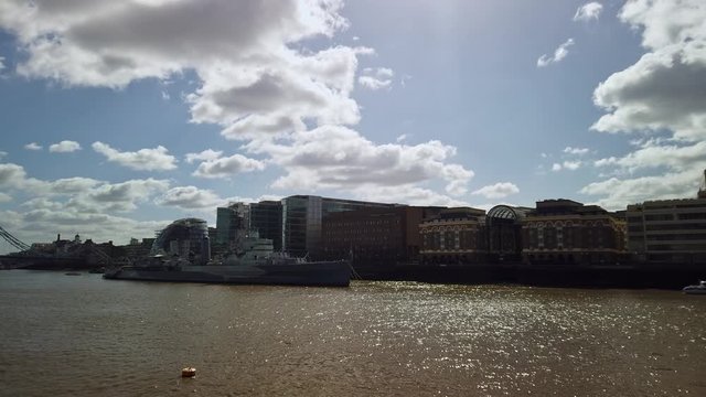 Timelapse of sunny day in central London, overlooking temse river