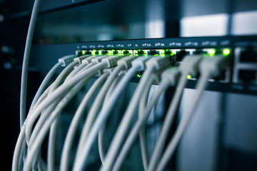 Network server room with servers, high performance computers running processes