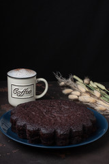 Tasty homemade chocolate cake with cup of coffe. Brownie. Chocolate pie.