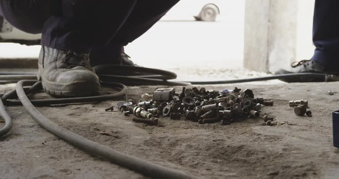 African men choosing tools