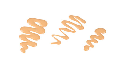 Liquid foundation swatch isolated on white background. Close Up of makeup cream sample.