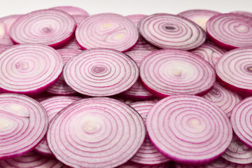 Onion slices as a background. Top view.