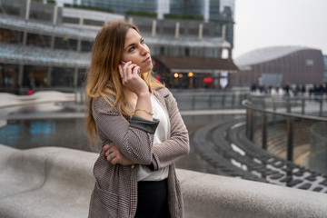 Fototapeta premium Happy Blonde Business Woman Talking On The Phone