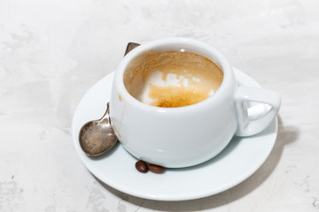 empty cup of coffee on a white background