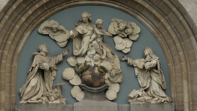 Static close up of catholic church artwork symbol monument in Belgium