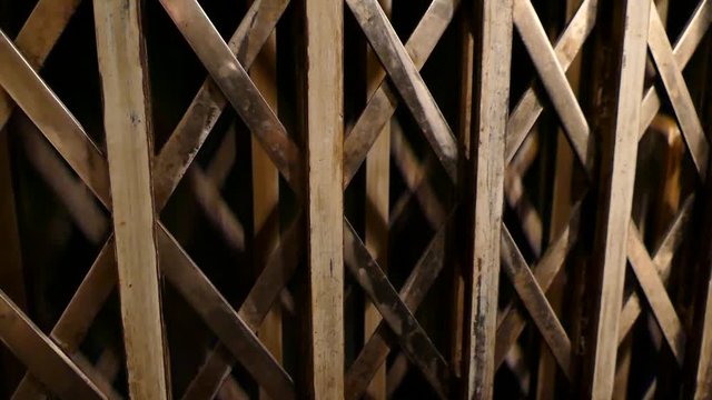 elevator in an old building with a safety cage