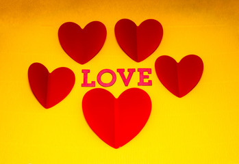 Valentine's card. A heart with a gift inside. Relationship between people. Soft background. The concept of romance.