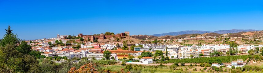 09.27.2019. Silves, Algarve, Portugal. Distant panoramic view of Silves in East Algarve showing the hilltop fort and church.