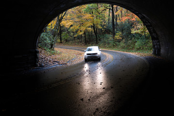 driving on the road, tunnel with light at end of tunnel, road in forest, road in autumn,Winding road, autumn foliage, Great Smoky Mountains