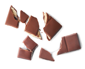 Milk chocolate isolated on white background. High resolution image