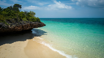 Fototapeta na wymiar Beautiful exotic beach on Zanzibar Tanzania