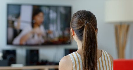 Woman watch tv at home