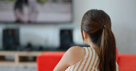 Woman watch tv at home