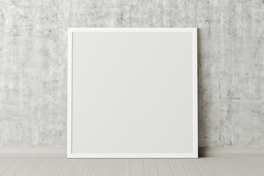Blank square poster frame mock up standing on white floor next to concrete wall. Clipping path around poster. 3d illustration