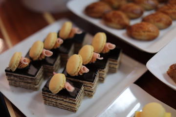 Cake shop with sweets on showcase table, close-up. 