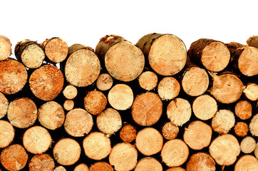 Firewood stacked and prepared for winter - pile of wood logs isolated on white background. © cobracz