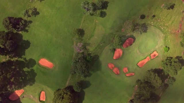 Golf club Tacuru, Misiones, Argentina, South America. Drone air view. Panoramic, cinematic clowckwise cam movement, green and runway.