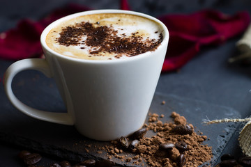 coffee in a white cup, coffee beans