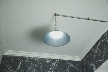Electric ceiling lamp on the room