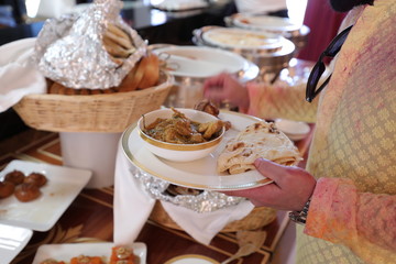 close up woman hand holding food plate 