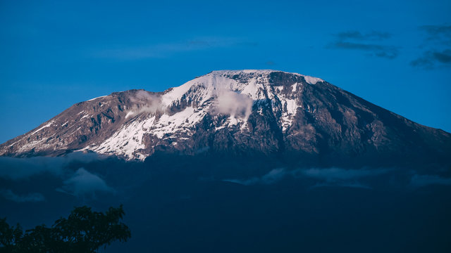 Mount Kilimanjaro with blue sky. Peak close up. Tanzania