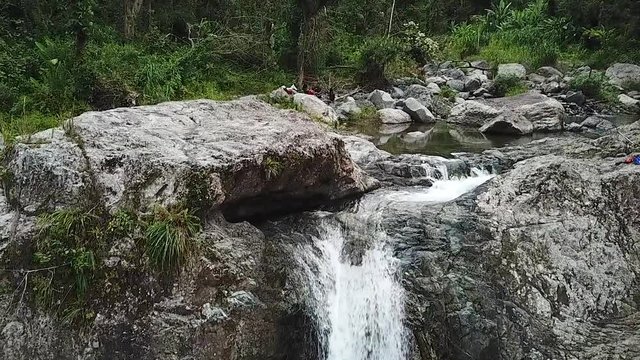 Cascade Waterfall Deep in Rainforest Jungle, Slow Motion Aerial View. Las Garzas, Charco El Ataud, Puerto Rico